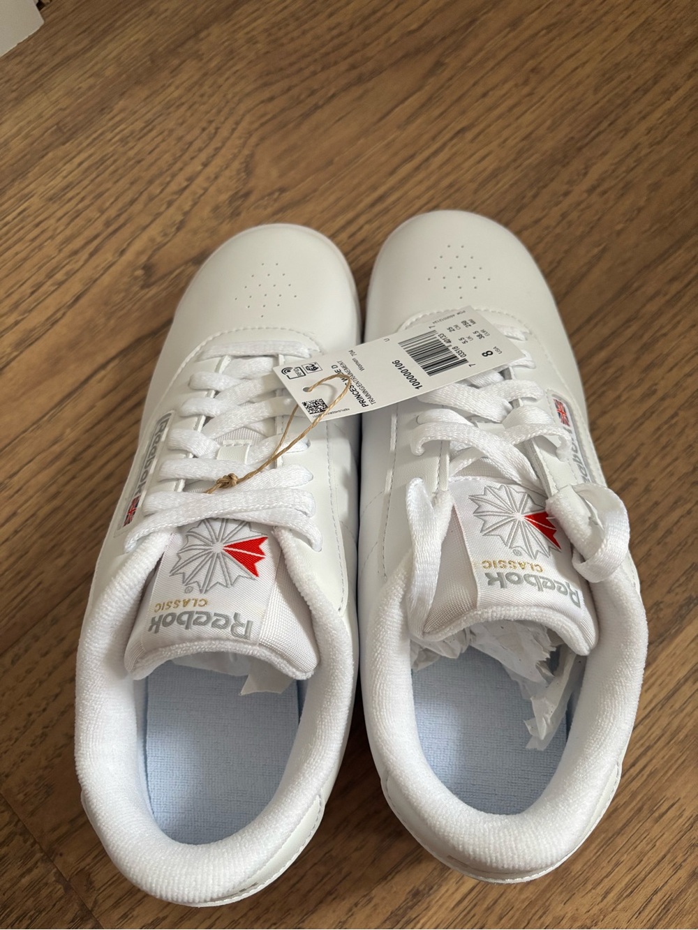 Reebok White Sneakers with Red Logo Accent